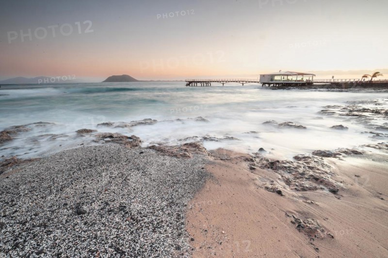 Long exposure at sunrise at the coast near Corralejo