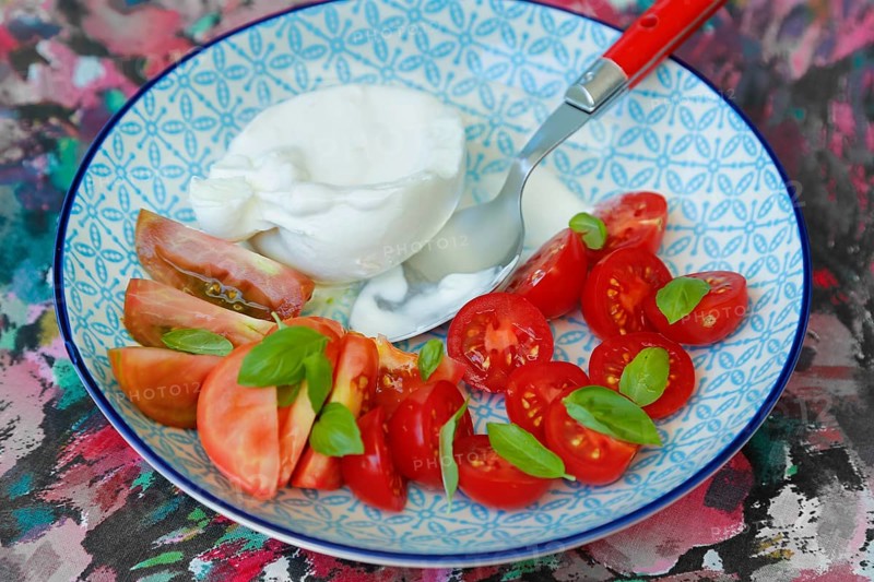 Tomatoes with basil and buffalo mozzarella
