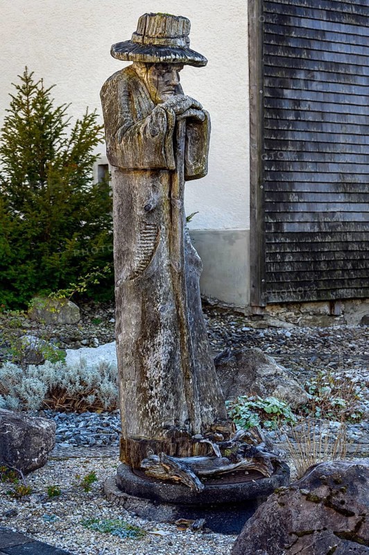 Roughly carved wooden figure