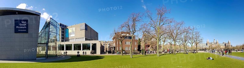 Panoramic photo of the modern architecture of the Van Gogh Museum building and park Museumplein