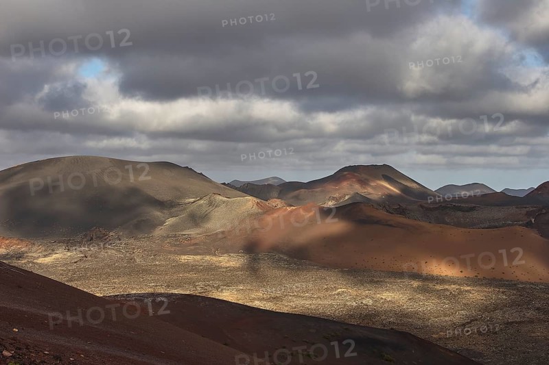 Different coloured lava hills