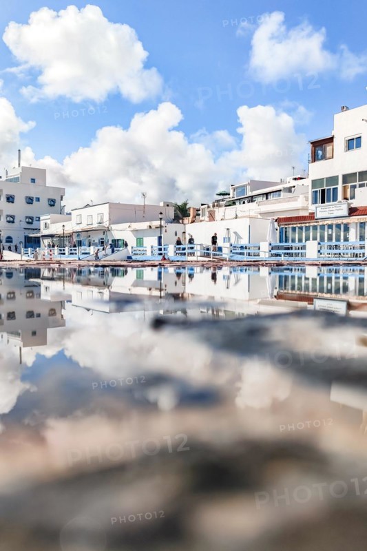 Typical white buildings and restaurants
