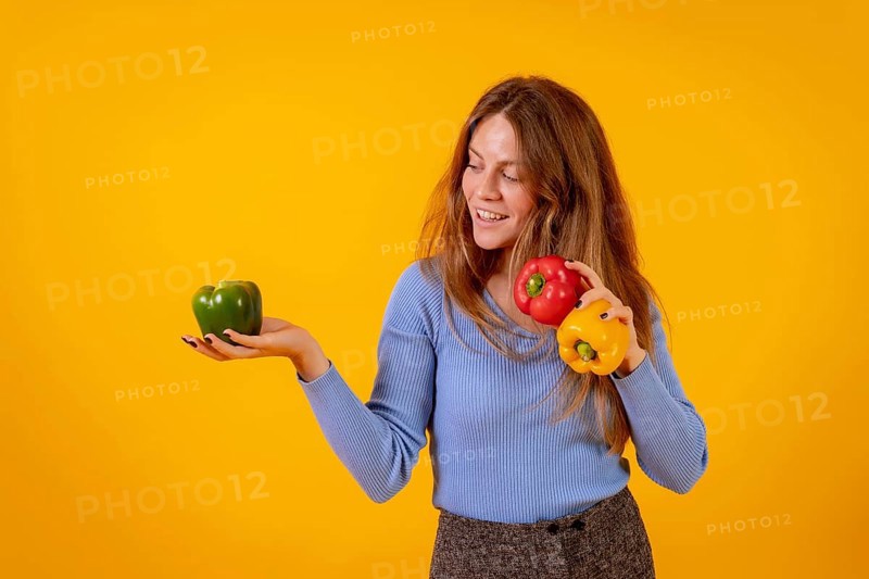 Vegan woman smiling with green