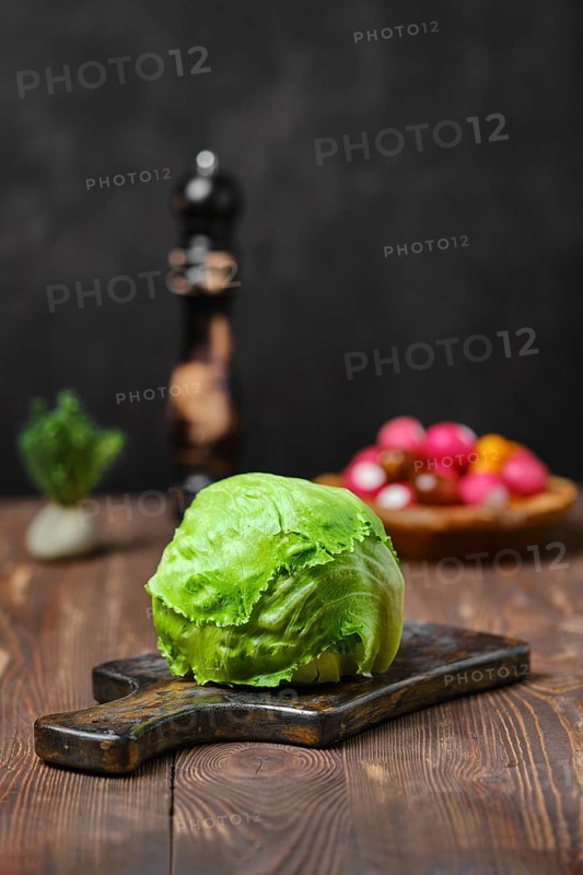 Fresh lettuce on cutting board