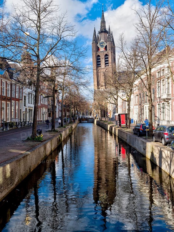 Oude Kerk Reformed Church and Canal with Reflection