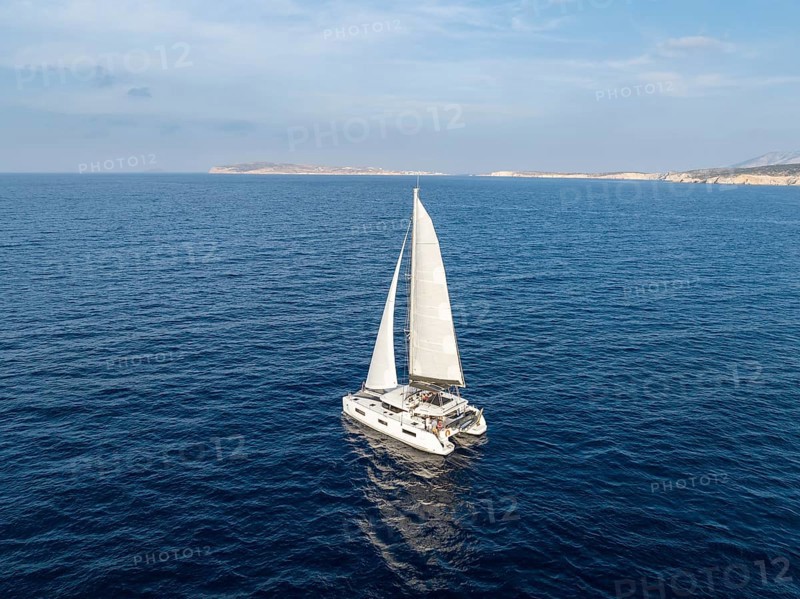 Sailing catamaran in full sail