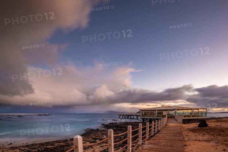 Long exposure at sunrise on the coast near Corralejo