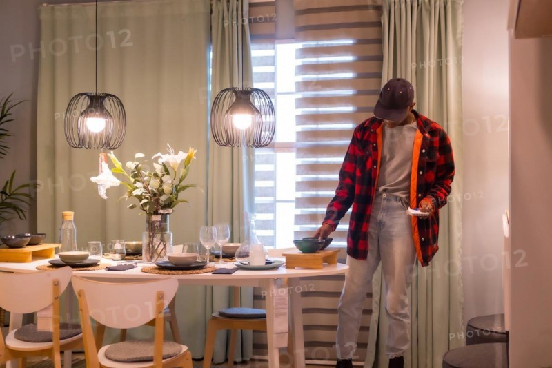 Black ethnic man shopping in a furniture store
