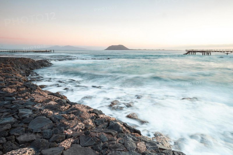 Long exposure at sunrise at the coast near Corralejo
