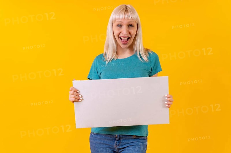 Holding white empty advertisement poster