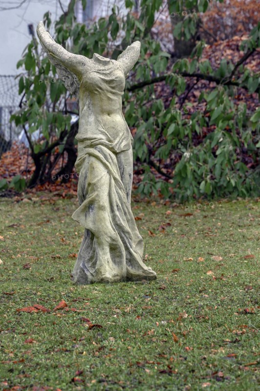 Headless angel statue in the garden