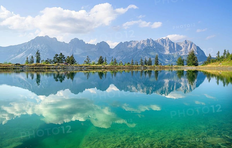 Idyllic Astbergsee with reflection of the mountain panorama