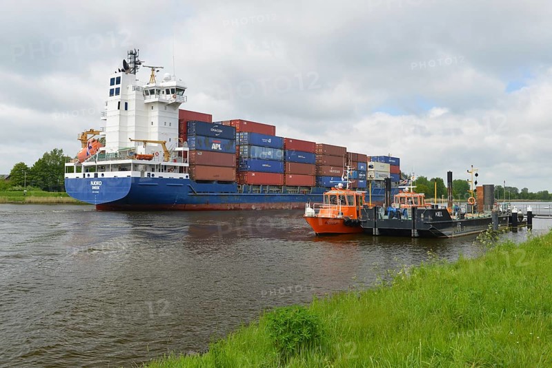 Container ship passing pilot station in Kiel Canal