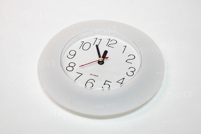 Wall clock shows 5 to 12