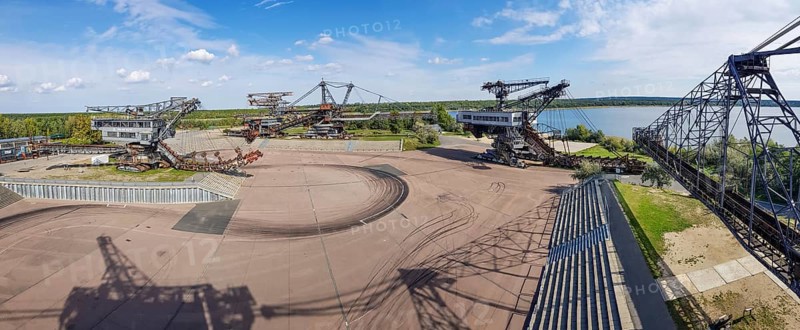 Panoramic photo of lignite excavator giants at the Ferropolis Industrial Heritage Open-Air Museum