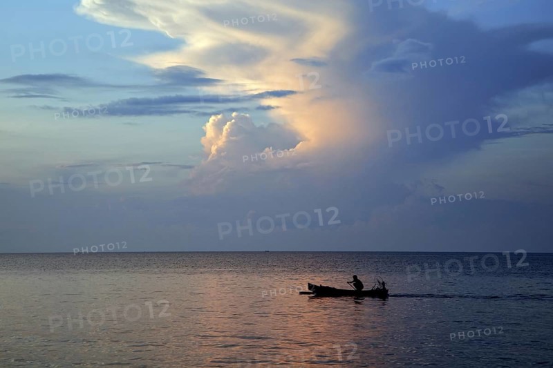 Fisherman in Indonesian jukung