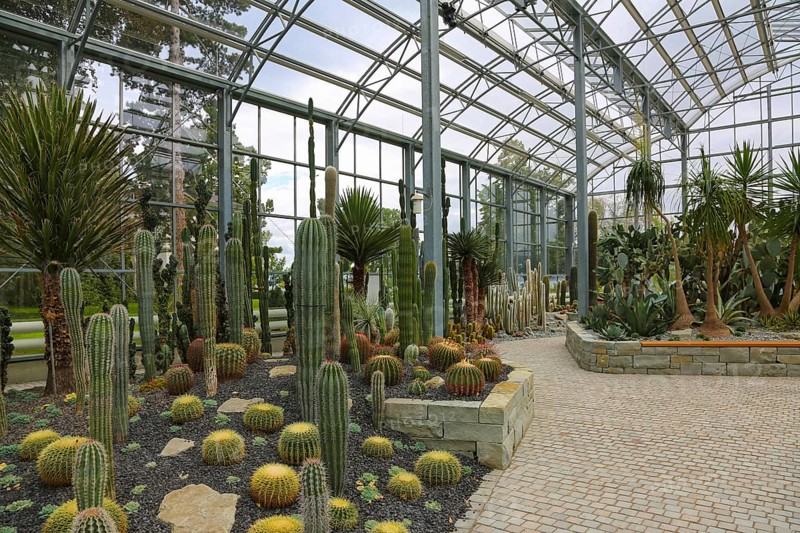 Glass plant house in the villa gardens by the lake