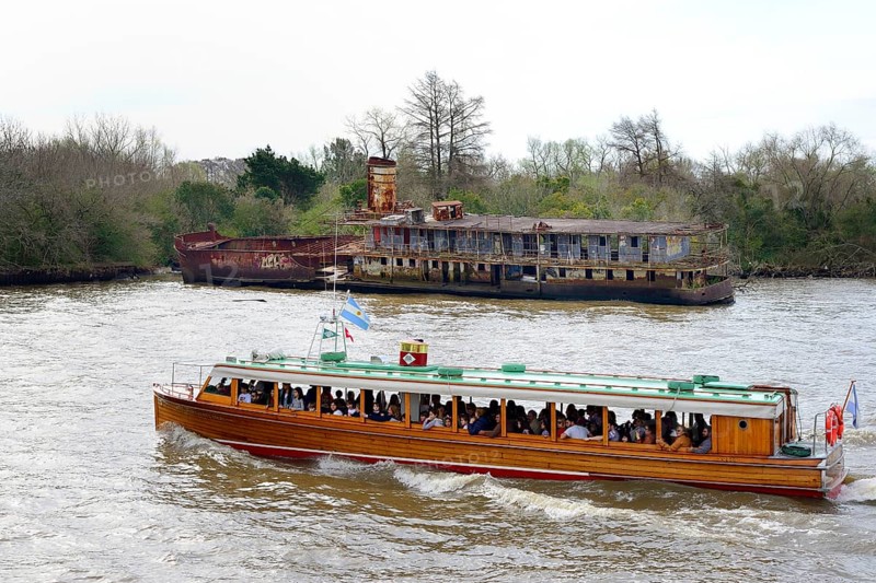 Excursion boat and shipwreck on the Rio Lujan