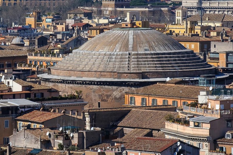 View from elevated position on historic dome of Pantheon Dome building from ancient Roman times of former Roman temple today Christian church rises above Roman old town