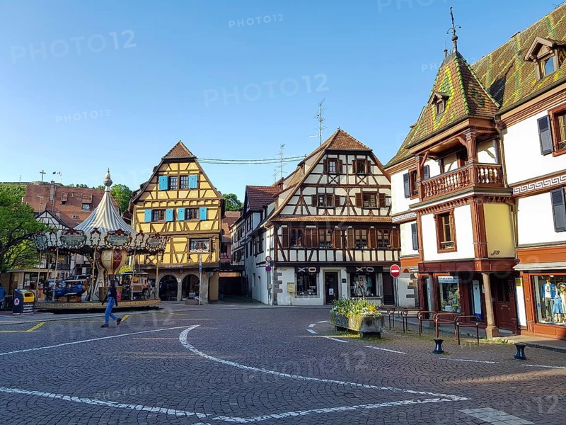 Carousel Carousel Adam and half-timbered houses in the square Pl. de l'Etoile