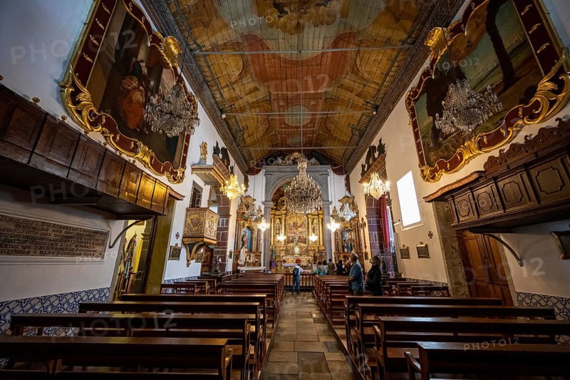 Interior with pews and ceiling painting