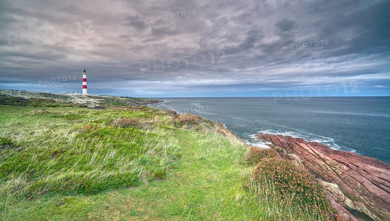 Tarbat Ness Lighthouse with cloudy sky