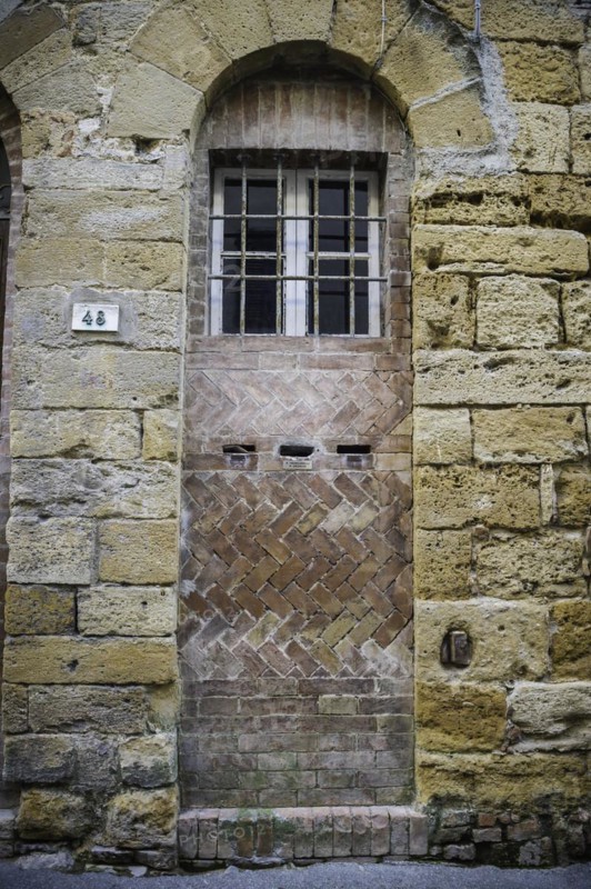 Doorway along cobbled street