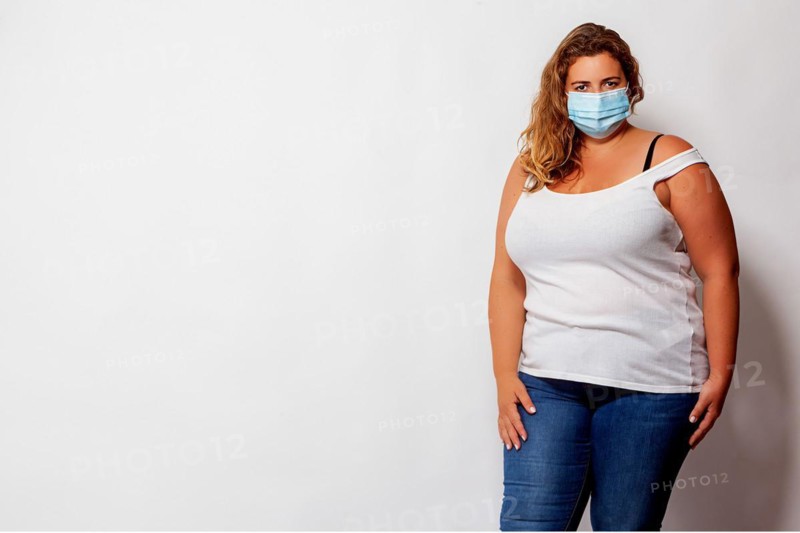 Portrait of a fat woman with plus size and mouth guard