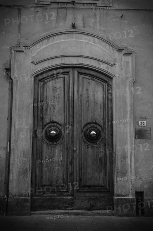 Doorway along cobbled street