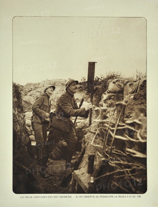 Soldier in trench checking with periscope where grenades strike in the battlefield at Diksmuide in Flanders during WWI