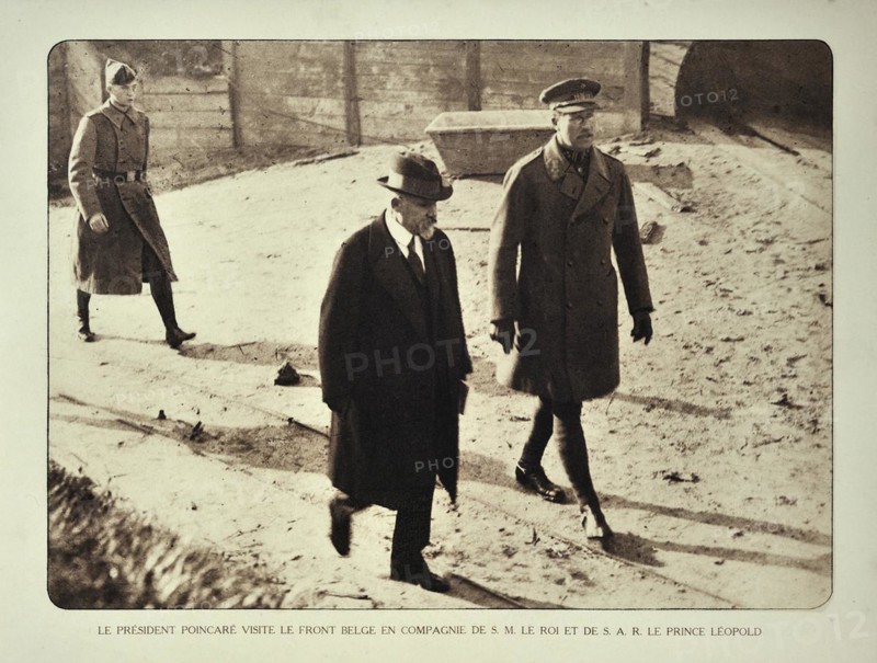 President of France Raymond Poincare meets the Belgian king Albert I and prince Leopold III in Flanders during WWI