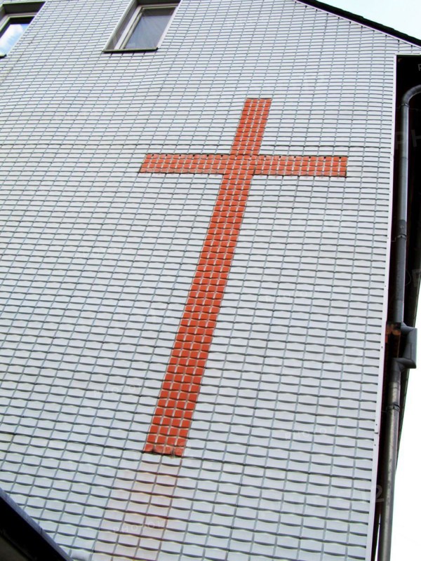 Cross on house facade