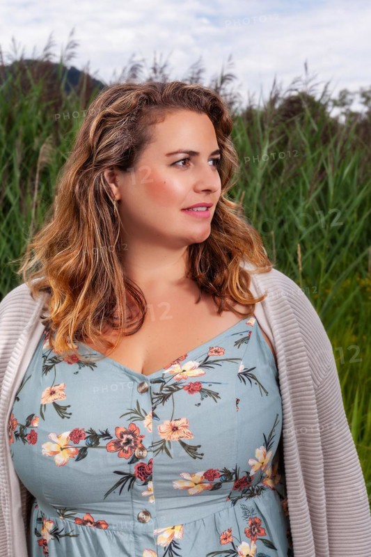 Portrait of a fat woman with long hair
