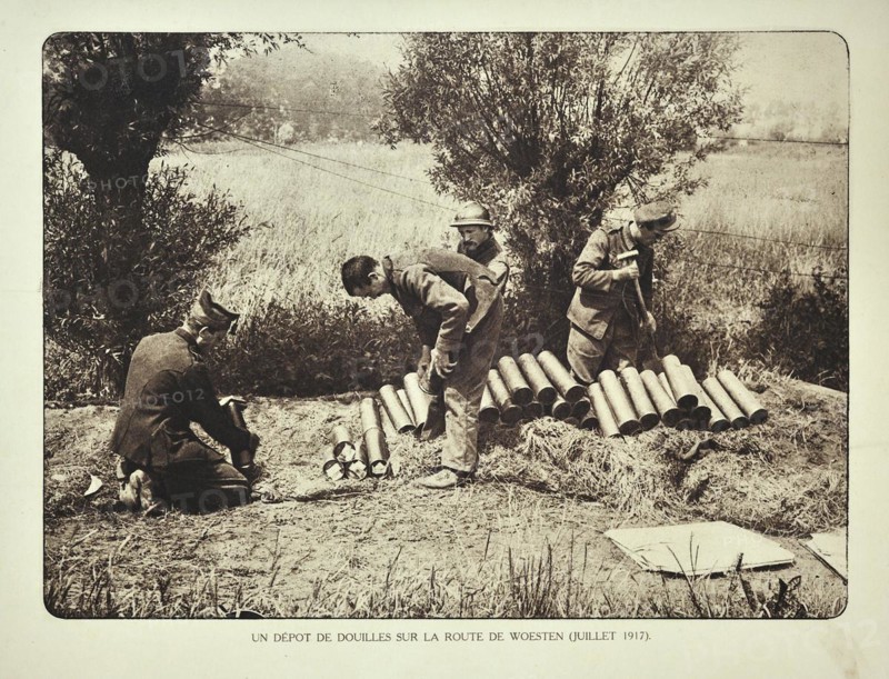 Soldiers collecting cartridge cases