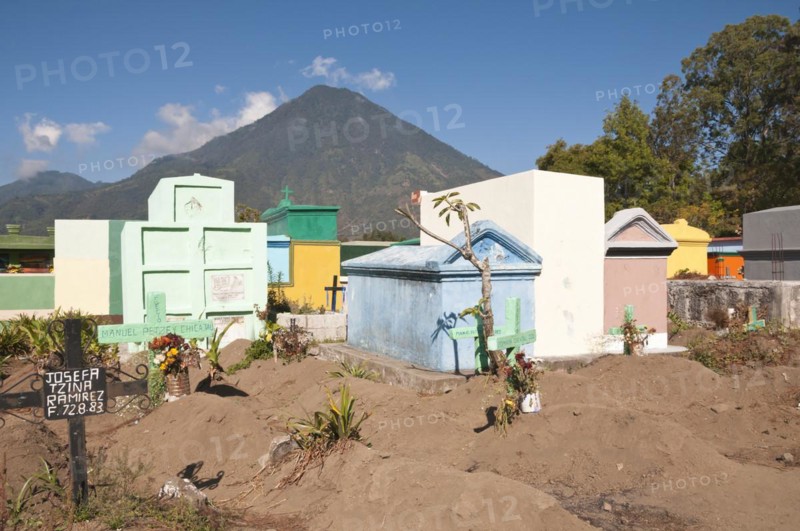 Colorful tombs in a cemetery on the shores of Lago de Atitlan