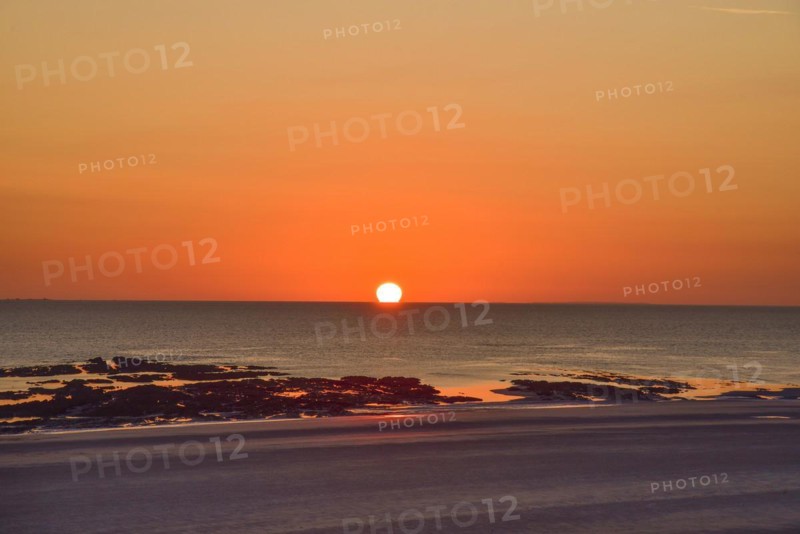 Sunset by the sea on the Cotentin Peninsula in Normandy