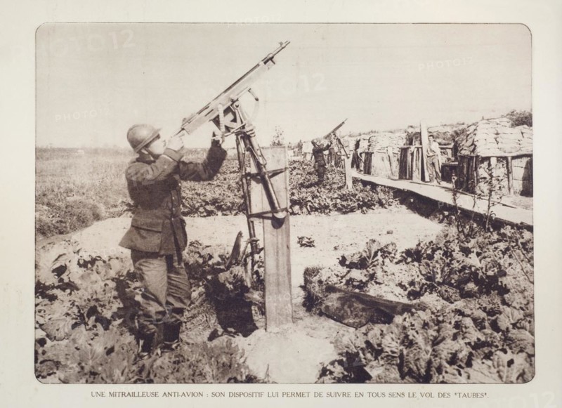 Soldiers in trench armed with anti-aircraft guns in Flanders during the First World War