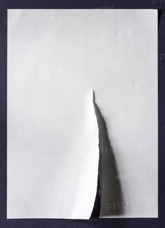 White sheet of paper with a tear