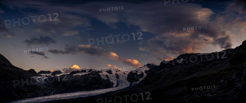 Morteratsch glacier in Bernina group with dramatic clouds