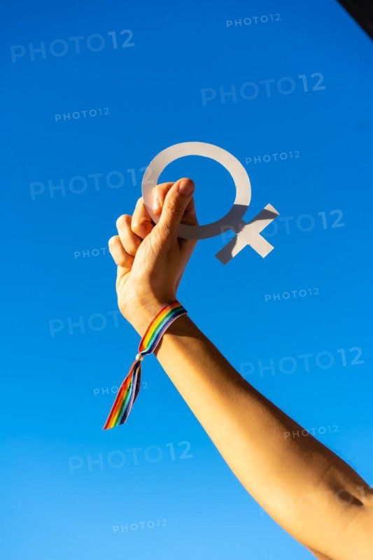 A woman with female symbol in favor of feminism