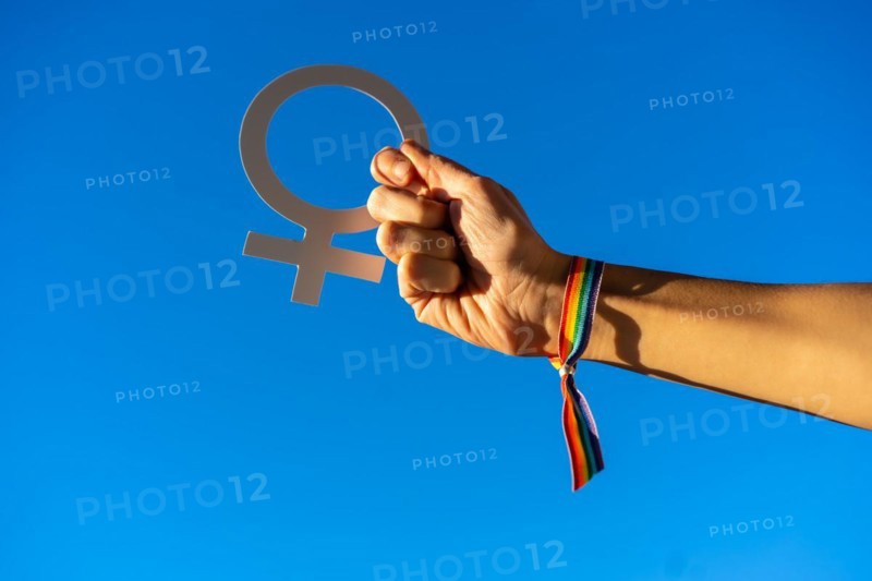 A woman with female symbol in favor of feminism