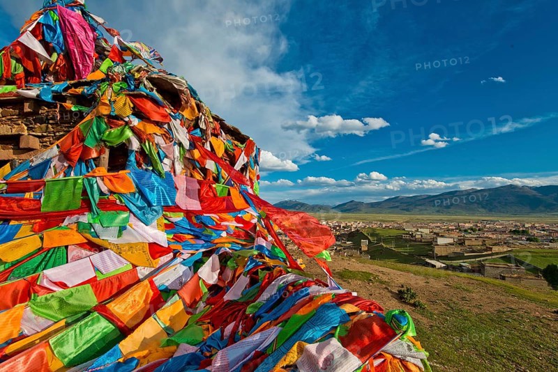Prayer flags near Litang Tibetan Buddhist Monastery overlooking the town