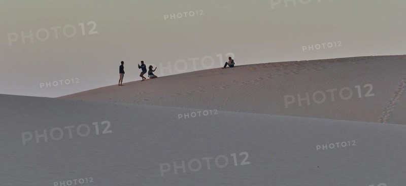 Dune in pale evening light