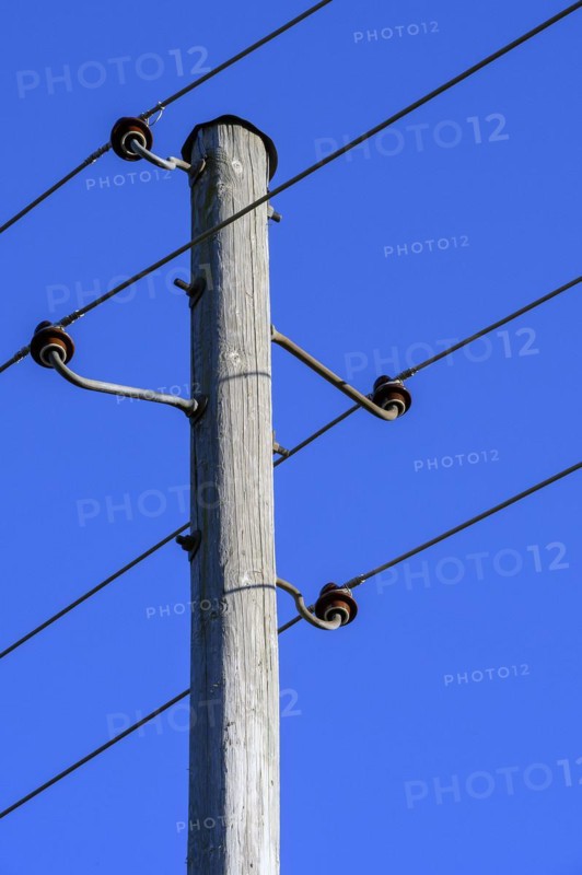 Wooden electricity pylon with ceramic insulators