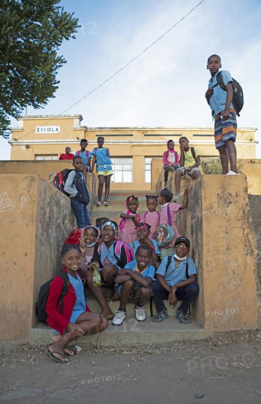 Schoolchildren in uniform in front of the village school in Rui Vaz