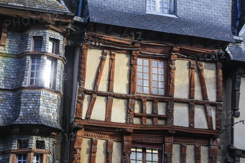 Half-timbered houses clad in slate on the Place du General Leclerc