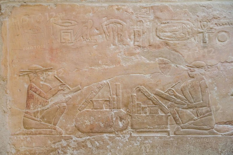Scribe with papyrus scrolls