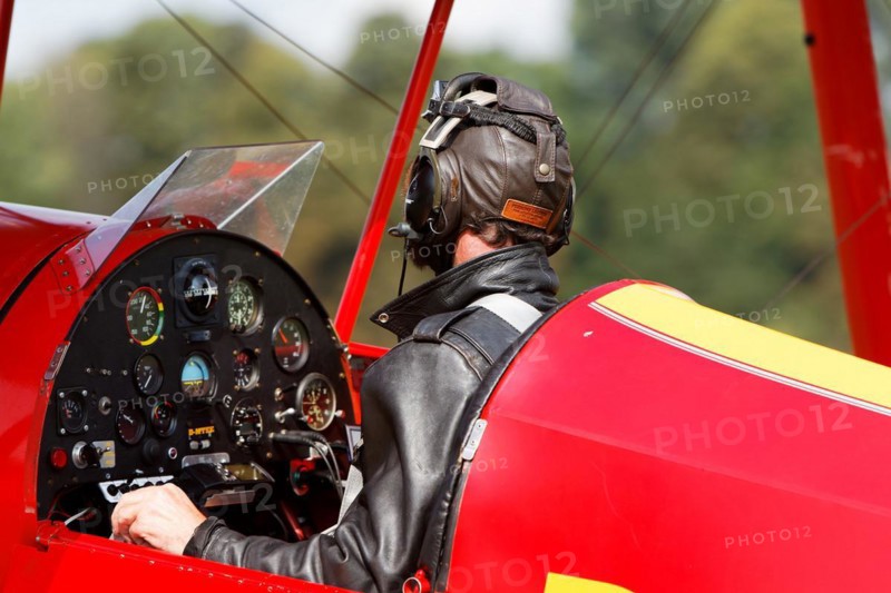 Pilot in his biplane