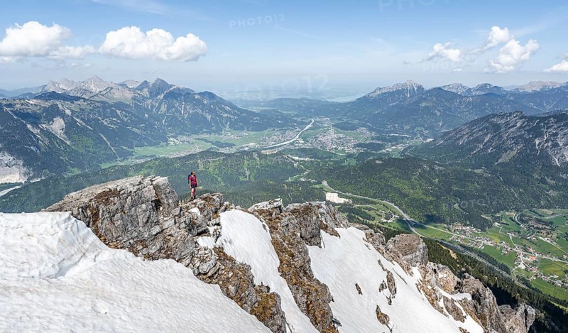 Hiker looking down from Thaneller