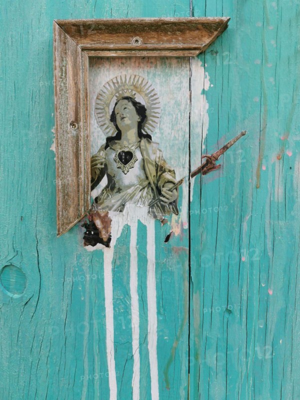 Remainder of a weathered picture frame from an old Madonna picture